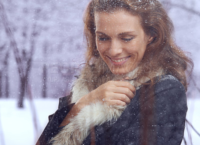 Buy stock photo Woman, snow and relax with winter fashion for cold weather and climate in a park in Iceland. Travel, calm smile and happy female person on a holiday freezing in nature with frost and ice outdoor