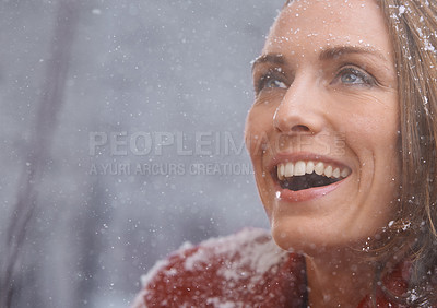 Buy stock photo Happy, excited and face of woman with snow outdoors for season, snowing weather and cold climate. Travel, fashion and person smile in nature on winter holiday, vacation and weekend in Switzerland