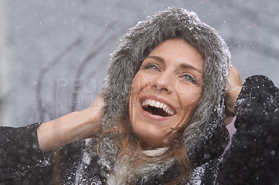 Buy stock photo Happy, laughing and face of woman with snow outdoors for season, snowing weather and cold climate. Travel, fashion and person smile in nature on winter holiday, vacation and weekend in Switzerland