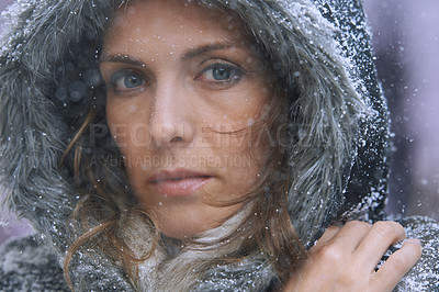 Buy stock photo Snow, woman and portrait in nature with cold climate and weather with winter fashion and idea. Ice, travel and freezing outdoor with a female person in Iceland with frost in a storm with jacket