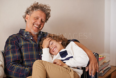 Buy stock photo Portrait of a grandfather spending quality time with his grandson indoors
