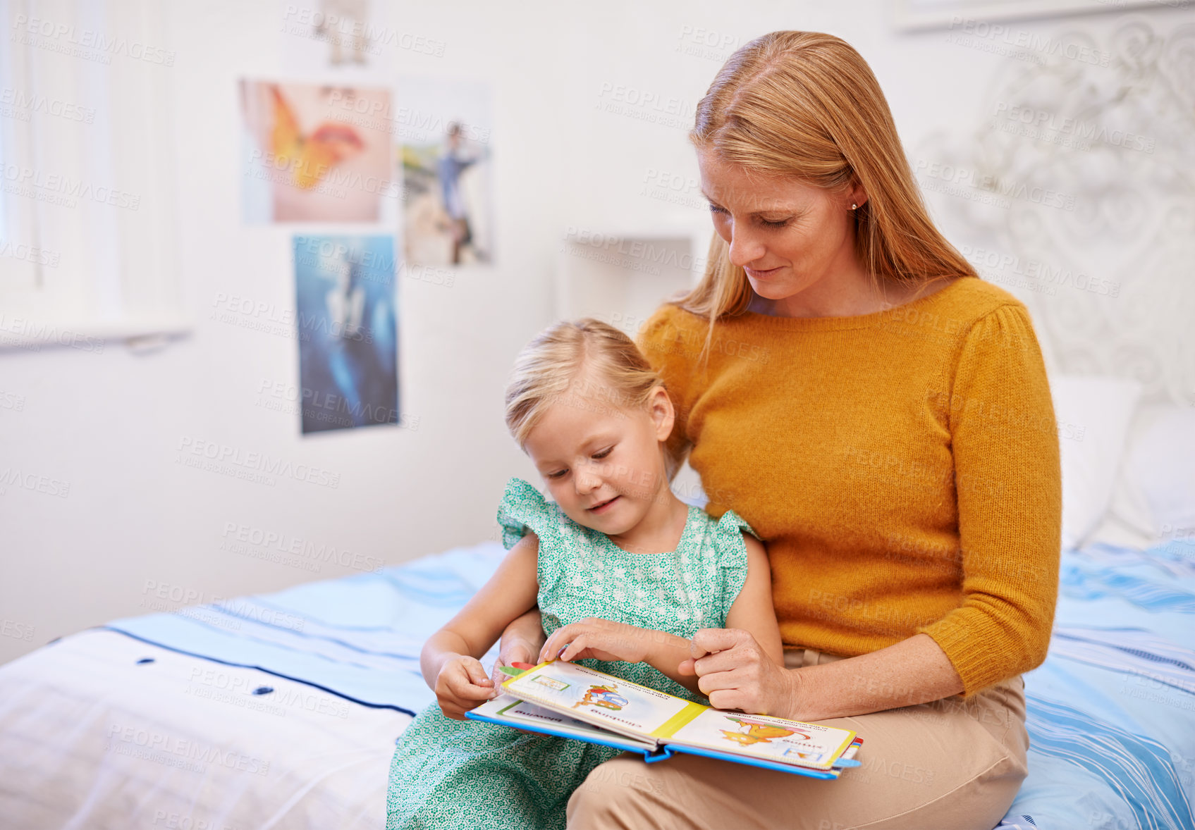 Buy stock photo Mother, child and reading book for bed in bedroom at family home with fantasy story for development. Love, care and support of a mom with a kid together with bonding and learning for education