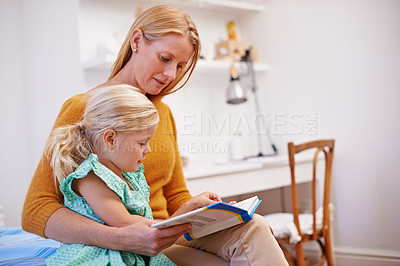 Buy stock photo Mother, child and youth book for reading in bedroom at family home with fantasy story for development. Love, care and support of a mom with a kid together with bonding and learning for education