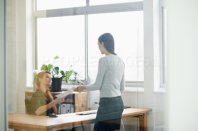 Buy stock photo Documents, resignation letter and business women in office for quitting, termination and unemployment note. Corporate, discussion and female worker giving manager paperwork to resign in workplace
