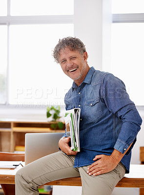 Buy stock photo Portrait, mature and business man laughing in office while holding tablet and paperwork. Entrepreneur, professional and male executive from Canada sitting on desk and laugh at funny joke or comedy.