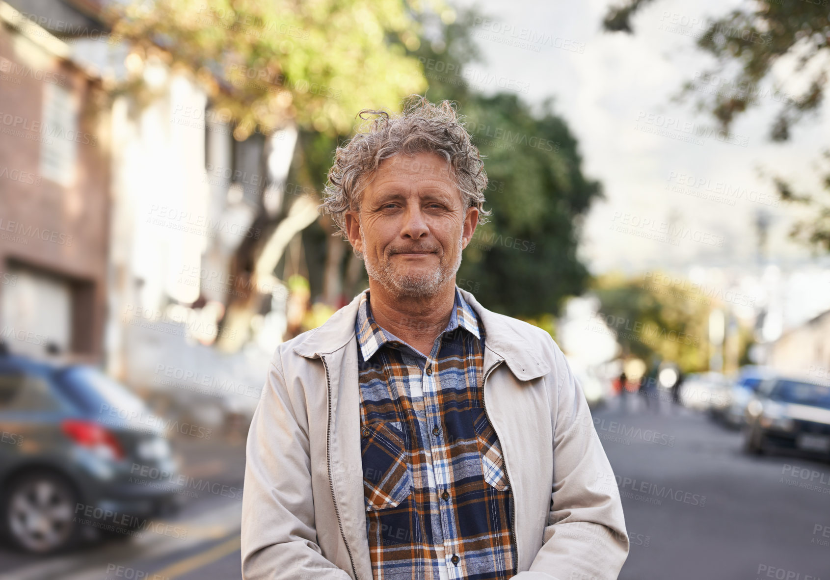Buy stock photo Portrait of a friendly-looking middle aged man outside