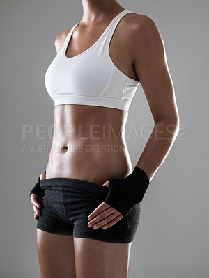 Buy stock photo Woman, six pack with body and kickboxing for fitness, strong with muscle and sweat from workout on grey background. Boxing, self defense training and athlete for sports, exercise and power in studio