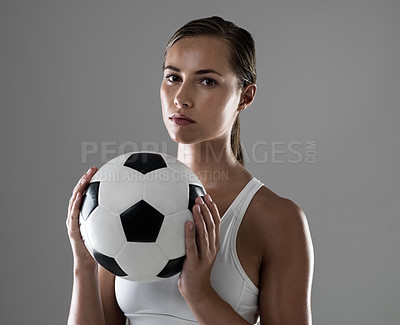 Buy stock photo Woman, portrait and athlete with soccer ball for match, game or kick off on a gray studio background. Female person or football player ready for sports exercise, workout or training on mockup space