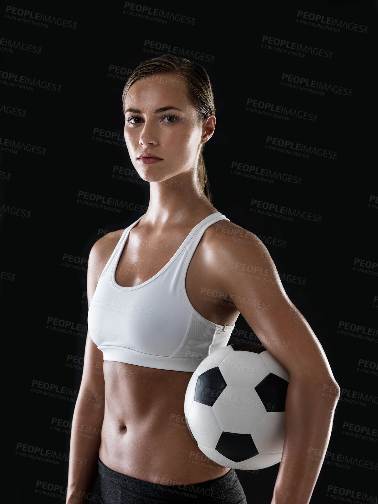 Buy stock photo Portrait of an athletic young woman ready to play a game of football
