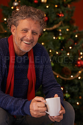 Buy stock photo Happy man, portrait and Christmas tree with coffee, mug or cup of tea for festive season or celebration at home. Face of senior or male person with smile for hot beverage, December holiday or weekend