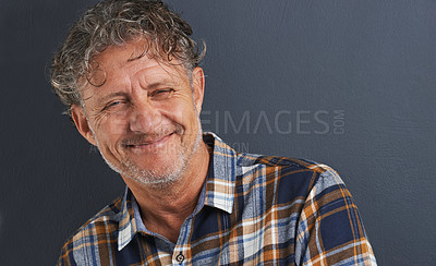 Buy stock photo Happy, man and mature portrait in studio on dark background with fashion or casual style. Confident, person and smile on face with pride or guy relax on mockup space with plaid pattern on shirt