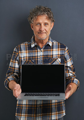 Buy stock photo Man, smile and laptop for marketing, advertising and social media for present, show or advice of information on screen. Mature person or executive with presentation on tech for online and internet 
