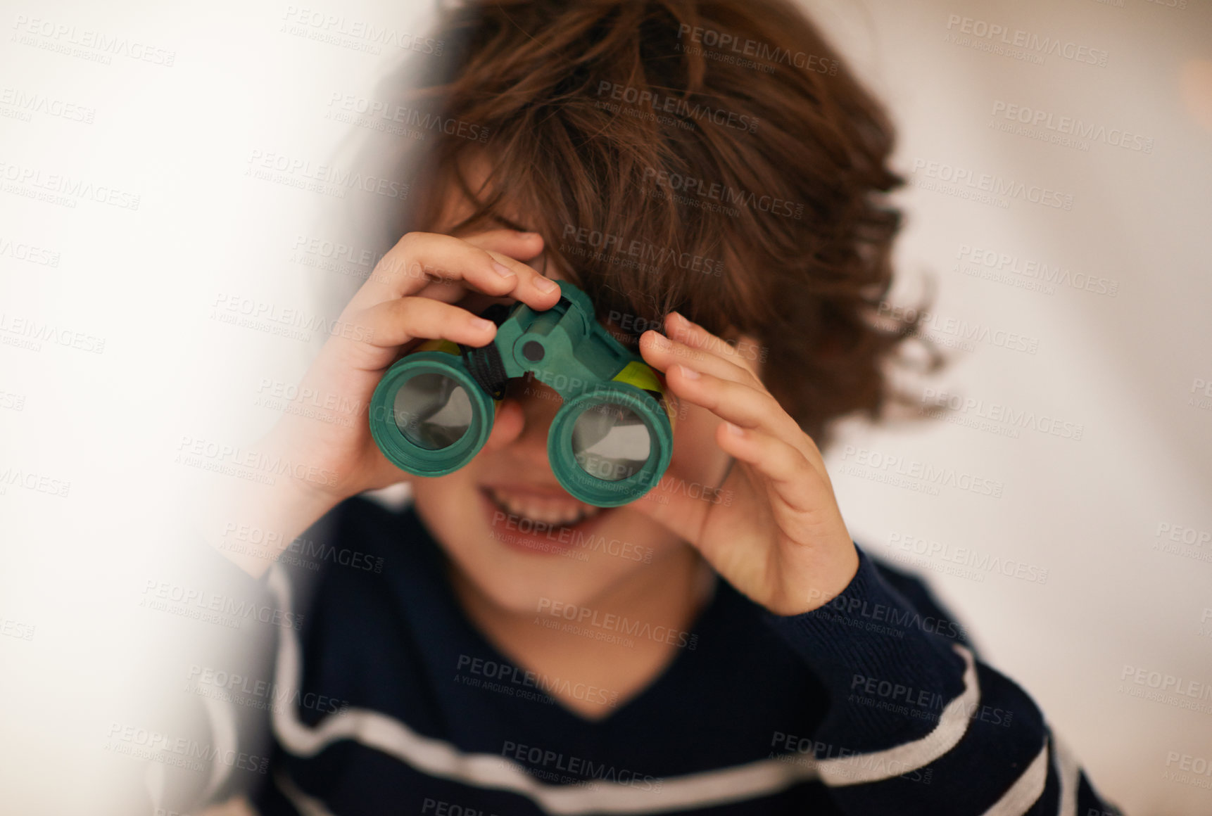 Buy stock photo Boy, child and binocular with toys and playing, youth for fun and innocent with search or surveillance. Investigate, looking or curiosity with discovery on adventure, playful with games and activity