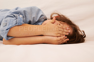 Buy stock photo Young child, hands over face and playful at home, peek a boo or hiding with childhood and innocent. Games, hide and seek with youth, covering eyes and kid playing, silly or goofy with blind emoji