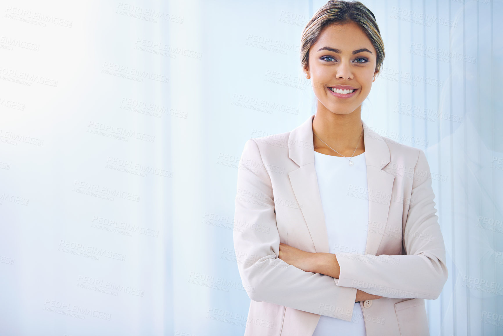 Buy stock photo Business woman, arms crossed and smile in portrait, paralegal at law firm and confidence with pride. Young professional, happy in career and legal expert at office with mockup space and corporate job