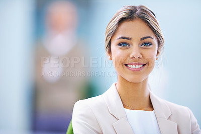 Buy stock photo Portrait of an attractive young businesswoman standing in an office