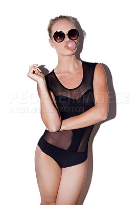 Buy stock photo Sunglasses, fashion and woman with bubblegum in studio isolated on a white background. Confidence, portrait and person blowing gum or candy with stylish model in leotard on a backdrop in Switzerland