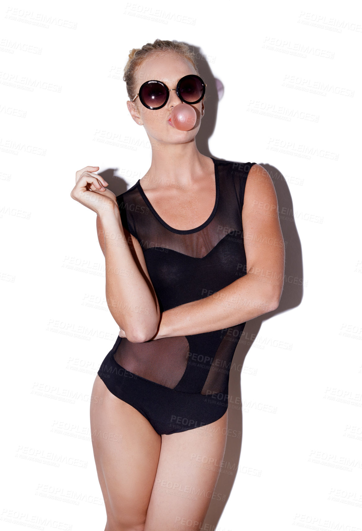 Buy stock photo Sunglasses, fashion and woman with bubblegum in studio isolated on a white background. Confidence, portrait and person blowing gum or candy with stylish model in leotard on a backdrop in Switzerland