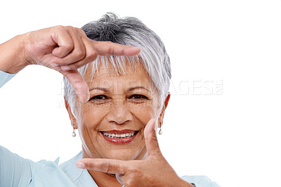 Buy stock photo Portrait, finger frame and senior woman with gesture, happiness and model isolated on a white studio background. Face, mature person and pensioner with mockup space and hands with confidence
