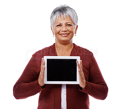 Buy stock photo Portrait, senior woman and tablet with screen, promotion and model isolated on a white studio background. Face, pensioner and old lady with technology and mockup space with opportunity and showing