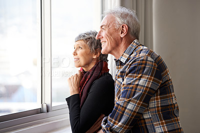 Buy stock photo Mature couple, man and woman in window of house, home and retirement holiday with happiness. Smile, elderly people and marriage for bonding, commitment and love in vacation for female and male person