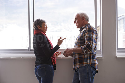 Buy stock photo Window, mature couple and communication with smile, conversation and discussion of retirement holiday. House, elderly people and marriage for bonding, commitment and planning for romantic vacation