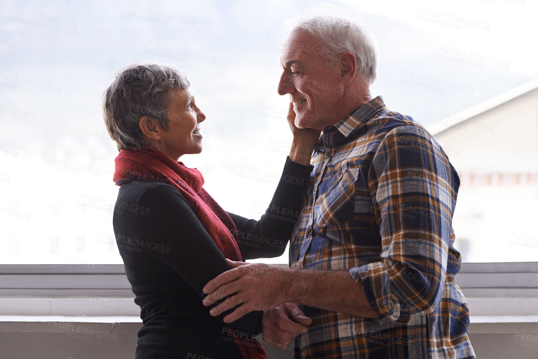 Buy stock photo Mature couple, love and commitment in home or house, vacation and retirement holiday with happiness. Smile, elderly people and marriage or relationship for bonding, care and romance of woman and man