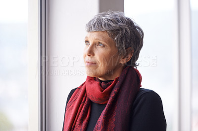 Buy stock photo Thinking, nostalgia and mature woman in window with memory, moment and reflection in home. Remember, face and elderly female in living room for thoughts, vision and feeling lonely in retirement