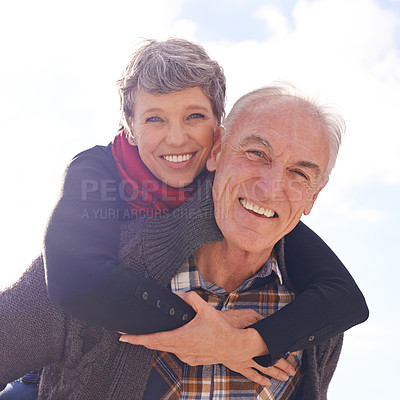 Buy stock photo Portrait, mature couple and piggyback or love on vacation, retirement holiday and celebrate with smile. Happy, elderly people and marriage or commitment for bonding, care and romance in relationship