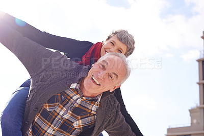 Buy stock photo Portrait, happy couple and piggyback or love in vacation, retirement holiday and celebrate with smile. Outdoor, elderly people and marriage or commitment for bonding, care and romance in relationship