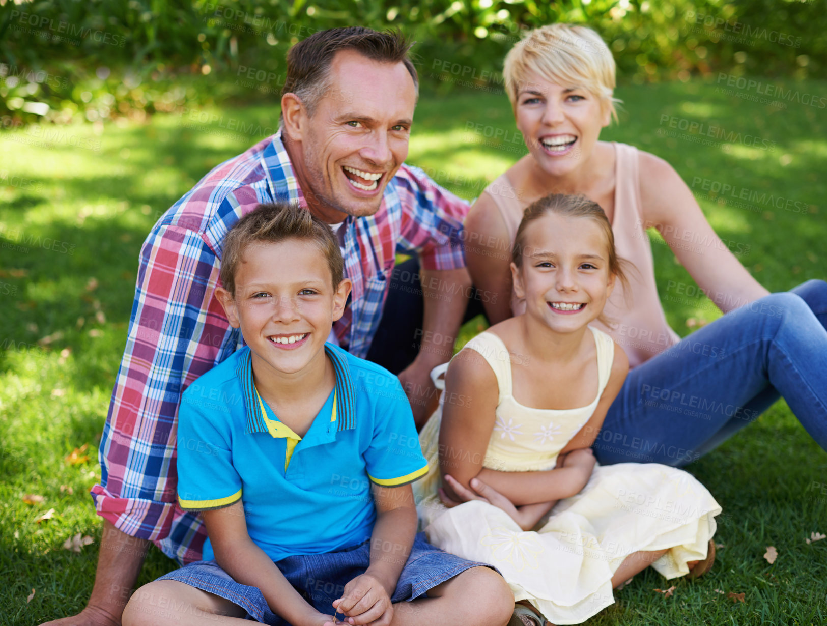 Buy stock photo Garden, grass and relax in portrait of happy family at home with care and love from parents for children. Mother, father and kids smile in backyard on holiday, vacation or together in summer on lawn