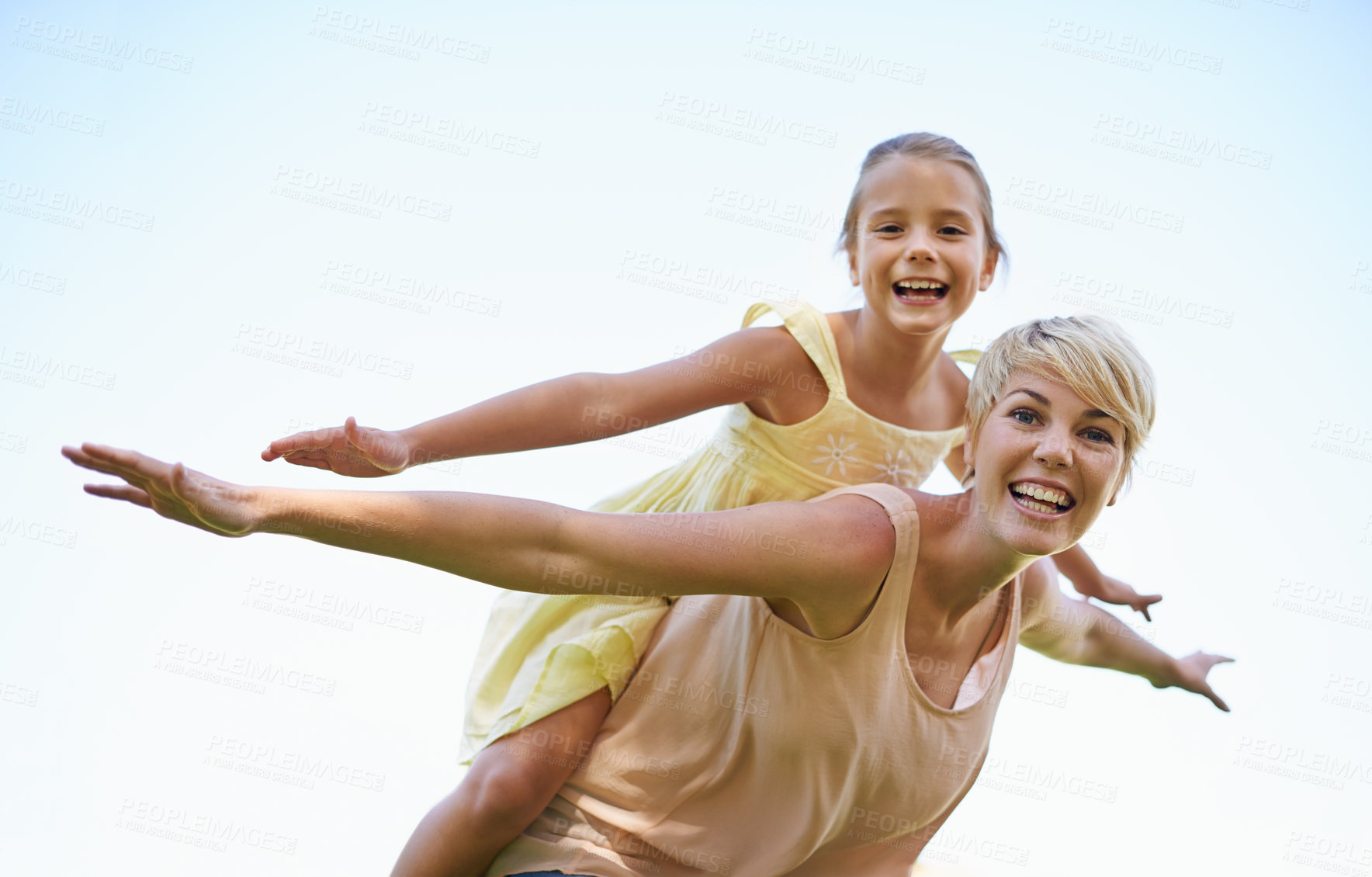 Buy stock photo Mother, child and portrait with flying arms or outdoor game in nature for bonding fun, playing or blue sky. Female person, daughter and airplane hands for vacation connection, traveling or carefree