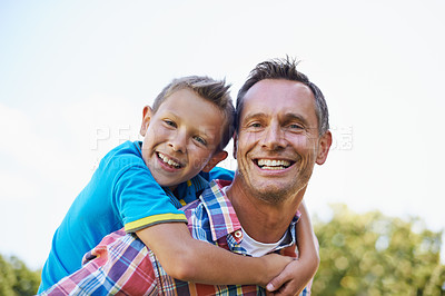 Buy stock photo Piggyback, portrait and dad with kid to play outdoors for bonding, love and happiness in garden for fathers day. Parent, son and together with care for summer fun in backyard with shoulder game