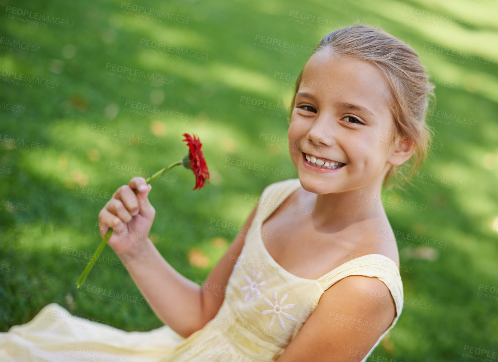Buy stock photo Child, portrait and smile with flower in garden for summer relaxing on holiday vacation, environment or plants. Female person, girl and face on backyard grass in Australia for spring, floral or happy