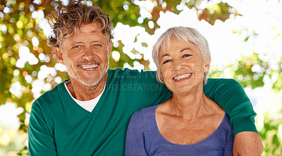 Buy stock photo Portrait of a mature couple sitting outdoors