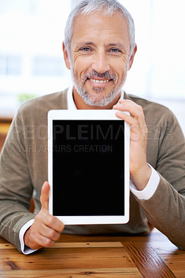 Buy stock photo Portrait, tablet screen and happy man or manager showing mockup space at desk in office for marketing business. Face, display and person with technology for advertising or promo of mature consultant