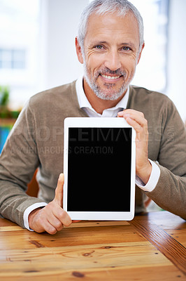 Buy stock photo Portrait, tablet screen and happy manager showing mockup space at desk in office for marketing business. Face, display and man with technology for advertising, info or promotion of mature consultant