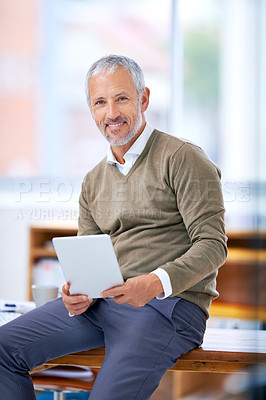 Buy stock photo Portrait, smile and businessman with tablet in office for website research on internet. Happy, reading and mature financial planner work on budget project with digital technology in workplace.
