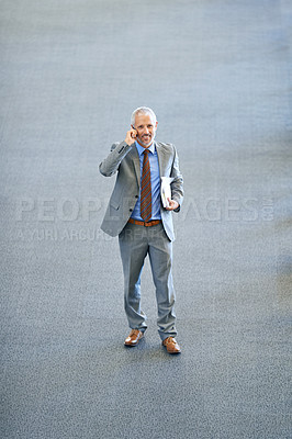 Buy stock photo Top view, office or senior businessman on a phone call talking, networking or speaking to chat in discussion. Mobile, planning or mature male entrepreneur in conversation, communication or deal offer