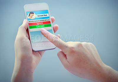 Buy stock photo A cropped shot of someone using a social app on their smart phone. All screen content is designed by us and not copyrighted by others, and upon purchase a user license is granted to the purchaser. A property release can be obtained if needed.