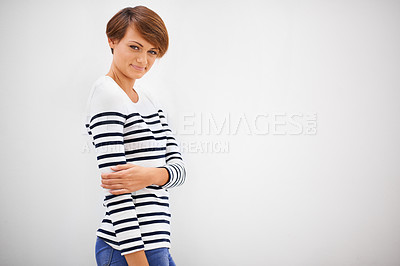 Buy stock photo Woman, portrait and smile in studio on mockup with casual fashion, confidence and relax on white background. Model, person and happiness on face with trendy clothes, cool outfit and calm attitude 
