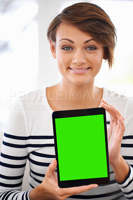Buy stock photo Cropped shot of an attractive brunette holding a tablet for display