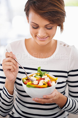 Buy stock photo Happy woman, diet and salad or eating healthy food for detox, breakfast and lunch at home. A young person with green fruits, vegetables and lettuce or vegan meal in bowl for nutrition and wellness