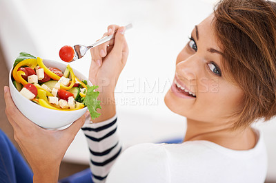 Buy stock photo Woman, salad and happy portrait with healthy food for diet, detox and breakfast on sofa at home. Person relax and eating vegetables, lettuce and green or vegan meal in bowl for nutrition and wellness