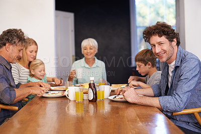 Buy stock photo Mature man, family and guest for breakfast at home on happiness in morning for bonding with conversation, support and care. Portrait, meal and eat with coffee in table to enjoy, fun and together. 