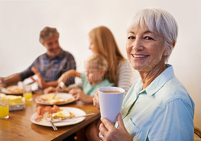 Buy stock photo Grandmother, family and smile for breakfast with happiness in morning for bonding with conversation, support and care. Portrait, senior woman and meal to eat with coffee at table, enjoy and together