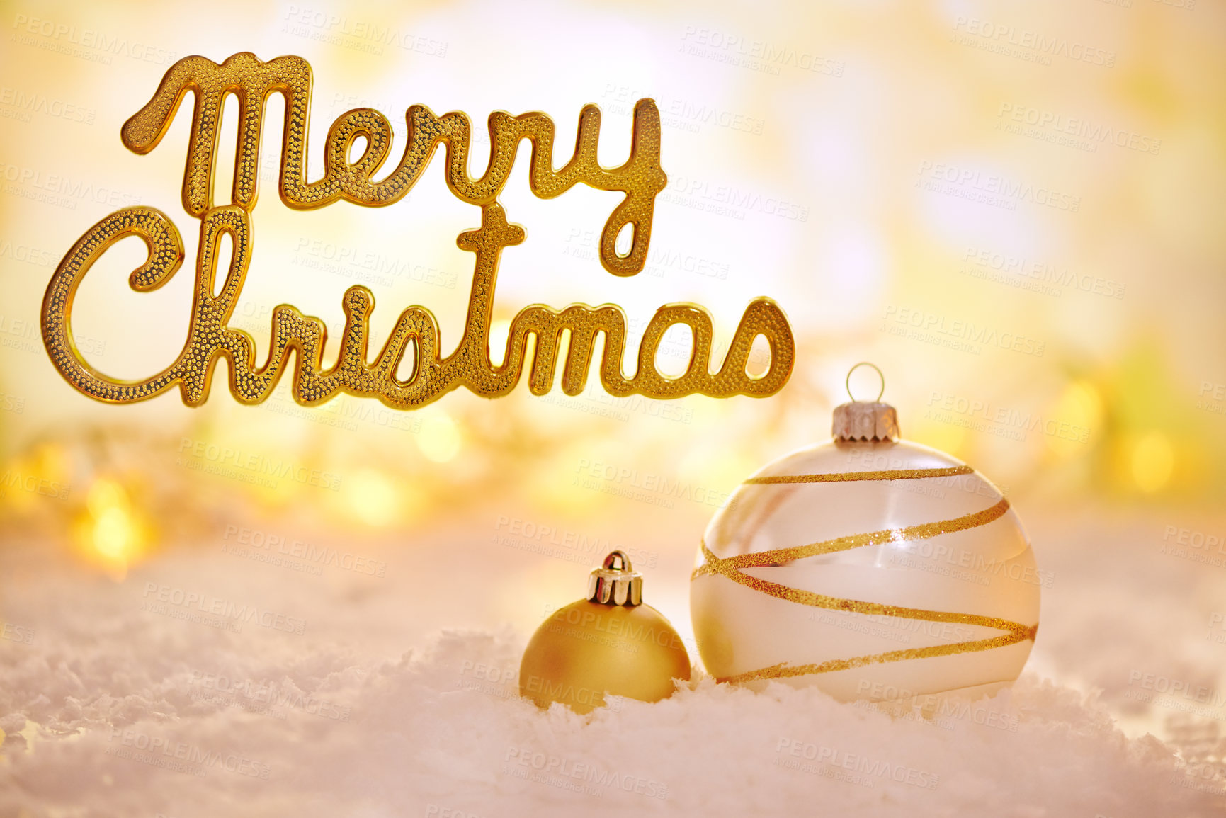 Buy stock photo Shot of golden Christmas decorations with a "merry christmas" message