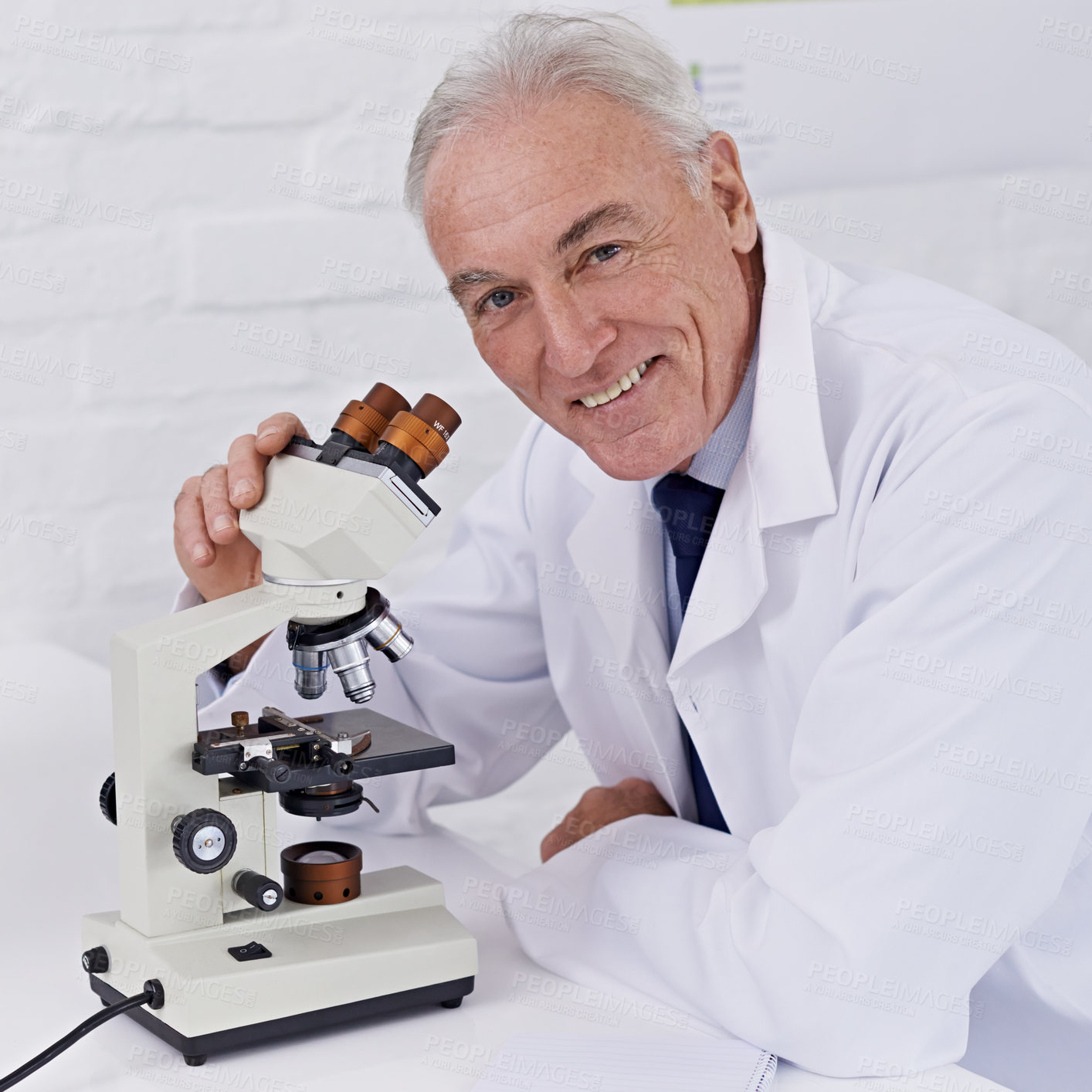 Buy stock photo Shot of a mature scientist working in a lab