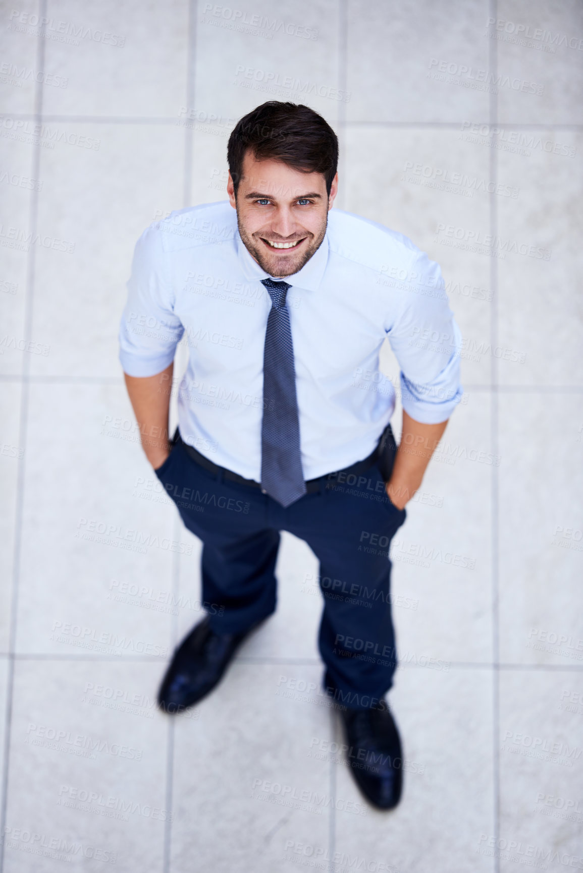 Buy stock photo Business, portrait and high angle of man in office with professional confidence and pride. Above, entrepreneur and person in lobby to start morning in London at corporate workplace with perspective