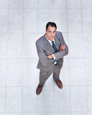 Buy stock photo Business, portrait and high angle of man with arms crossed in office with professional confidence and pride. Above, entrepreneur and person in lobby to start morning in London or corporate workplace